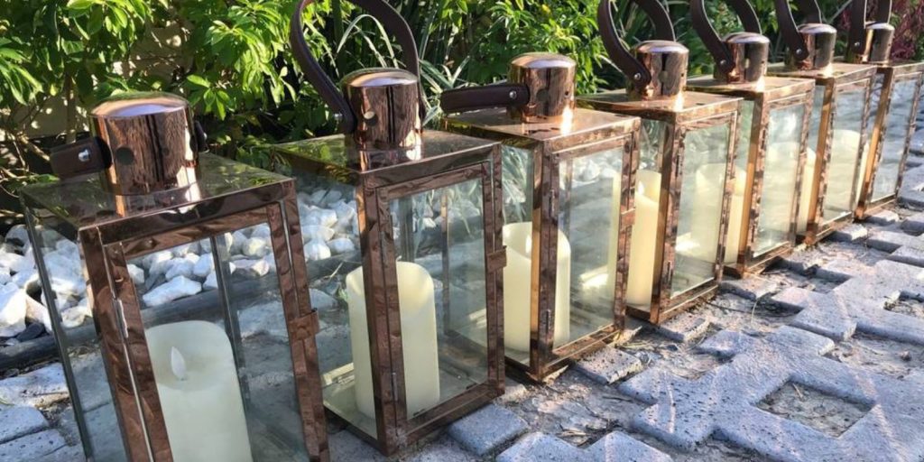 Quinques Color Cobre con Vela Renta de Mobiliario y Decoración