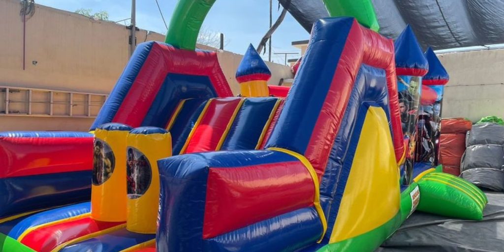Renta de Inflable con temática escalador mix