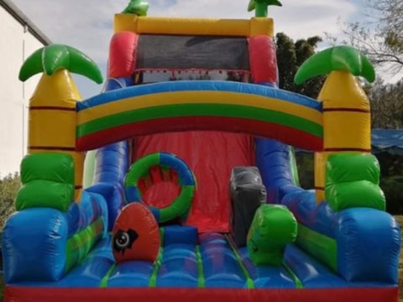 Renta de Inflable Interactivo Jurásico palmeras